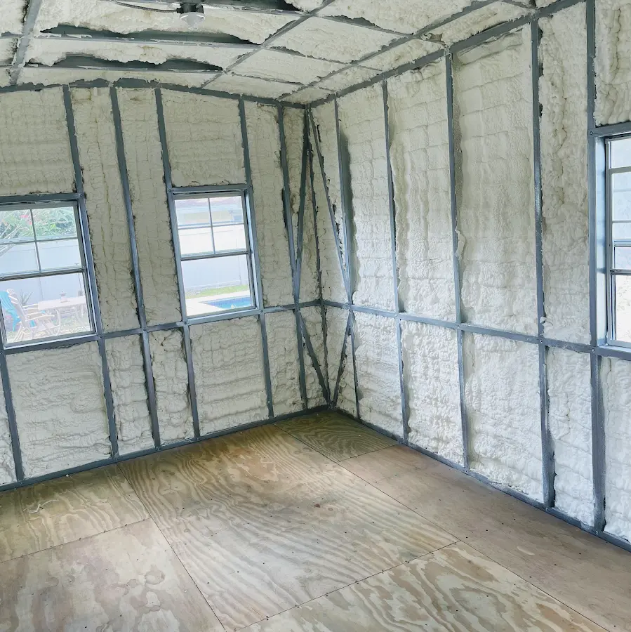 Closed-cell spray foam insulation applied to wall cavities in a residential project in Yankee Springs