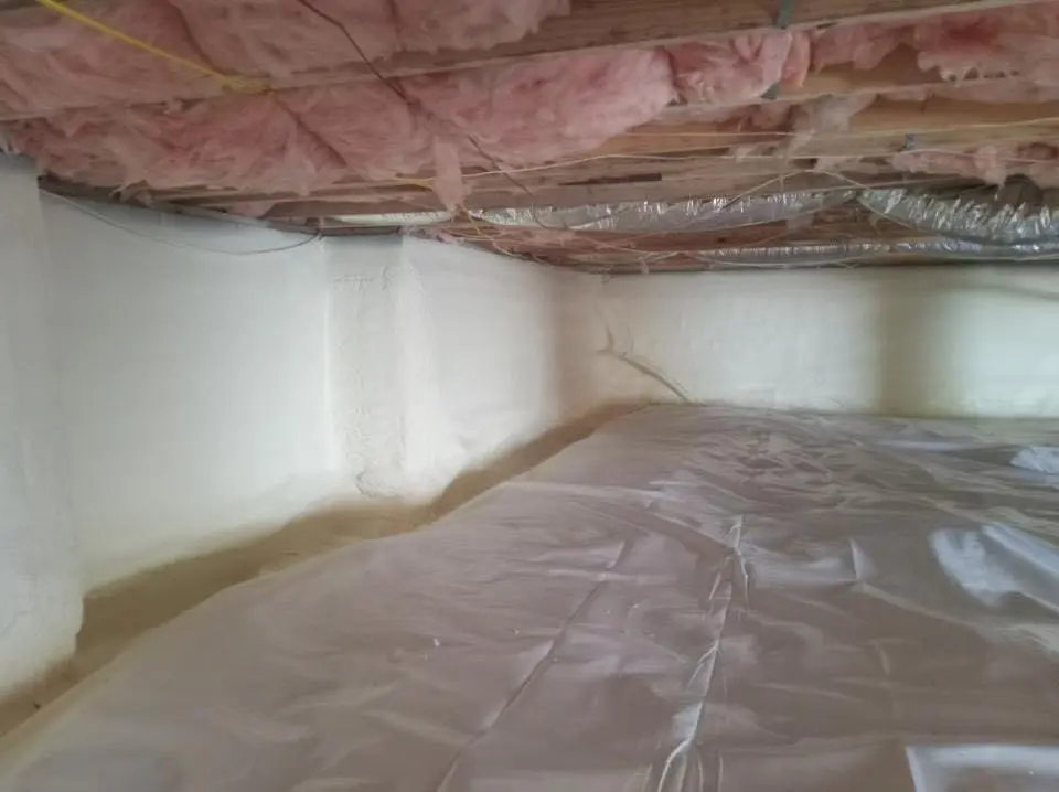 Crawl space encapsulation with closed-cell spray foam for Commercial Roof Restoration in Yankee Springs